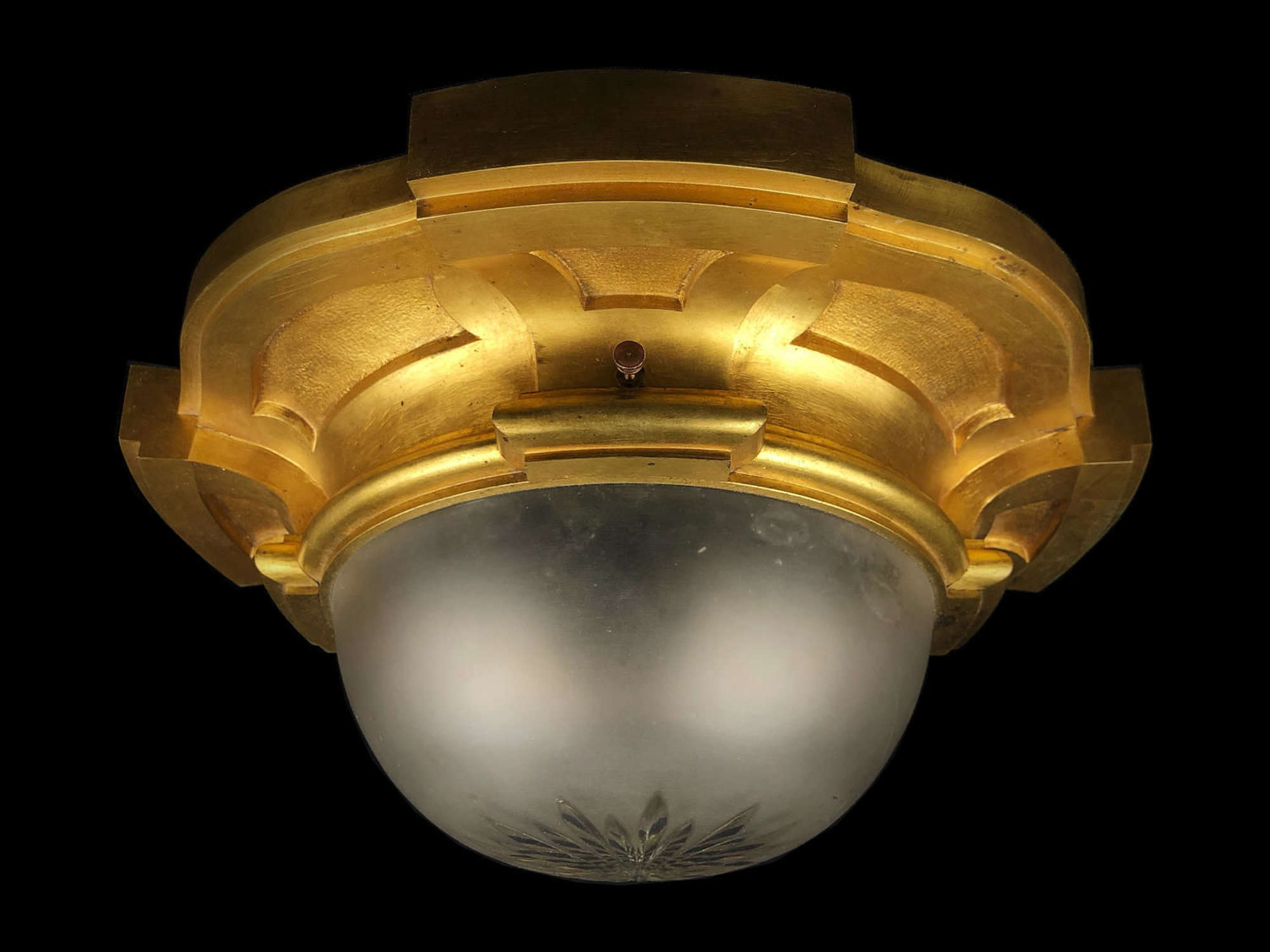 A gilt brass and frosted glass ceiling light