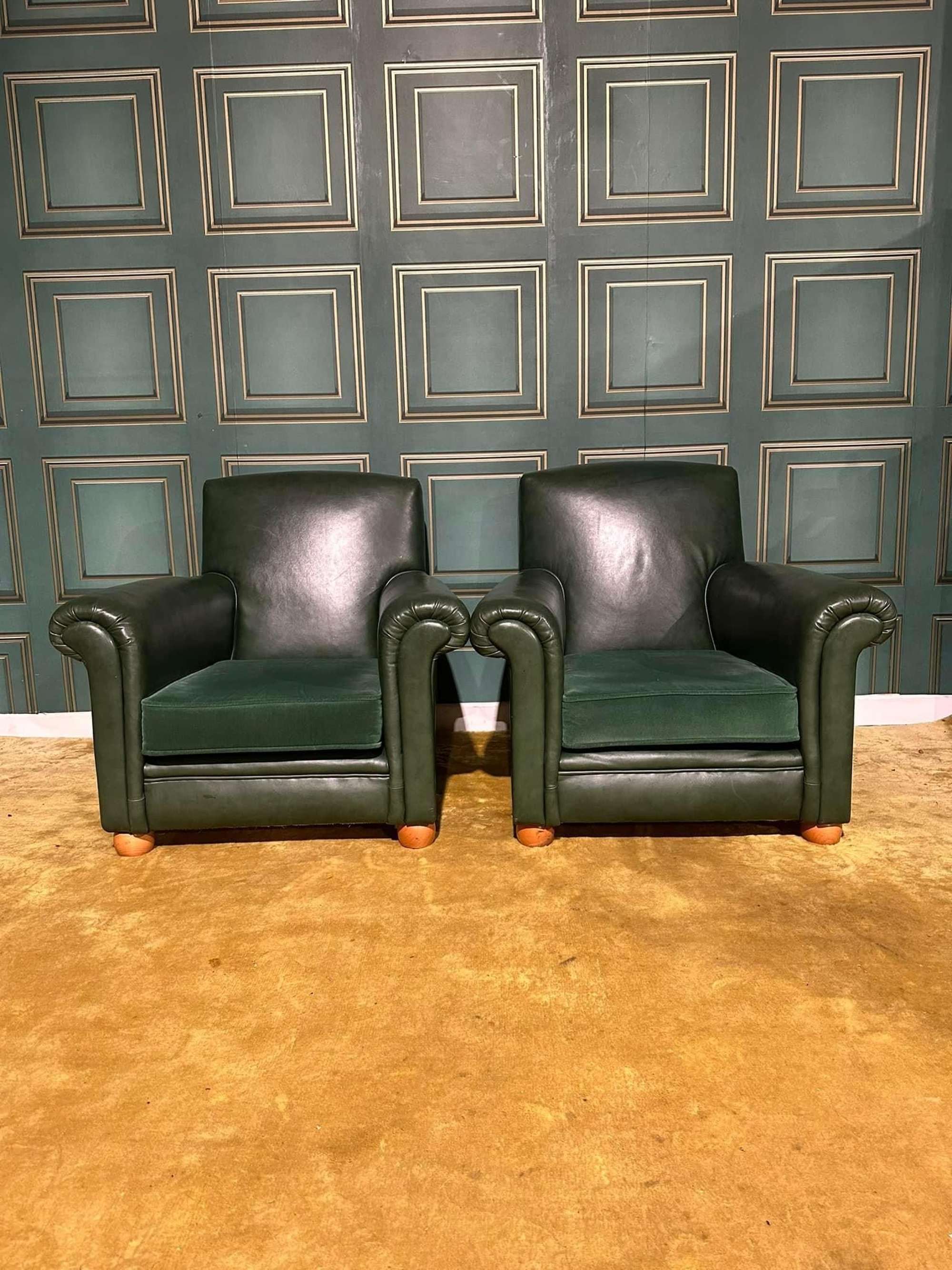 Pair Of Green Leather Upholstered Club  Vintage Armchairs On Bun Feet