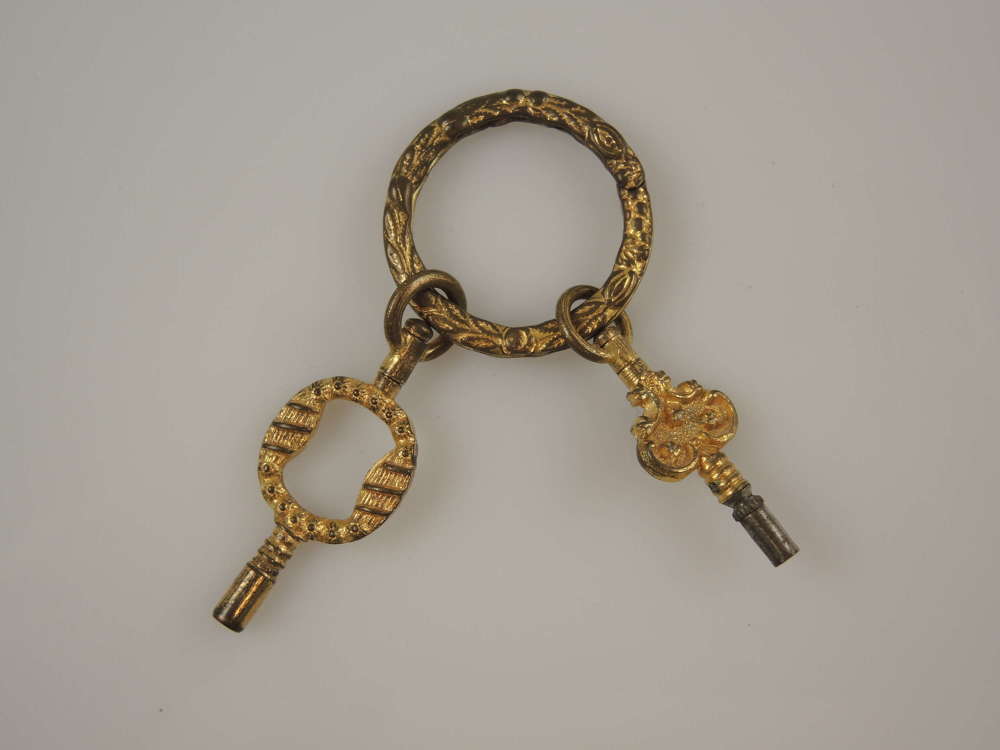 Superb gilt Georgian pocket watch key with carved split ring c1810