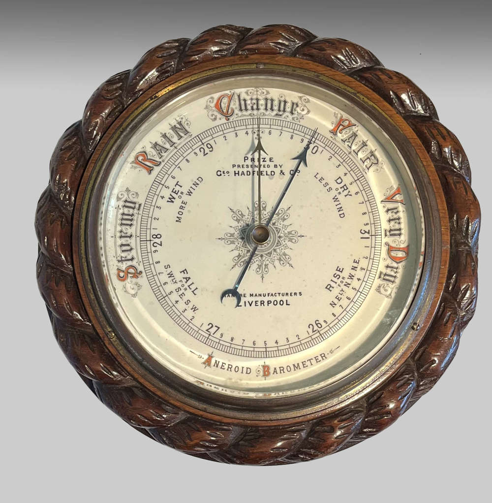 Edwardian oak cased aneroid barometer
