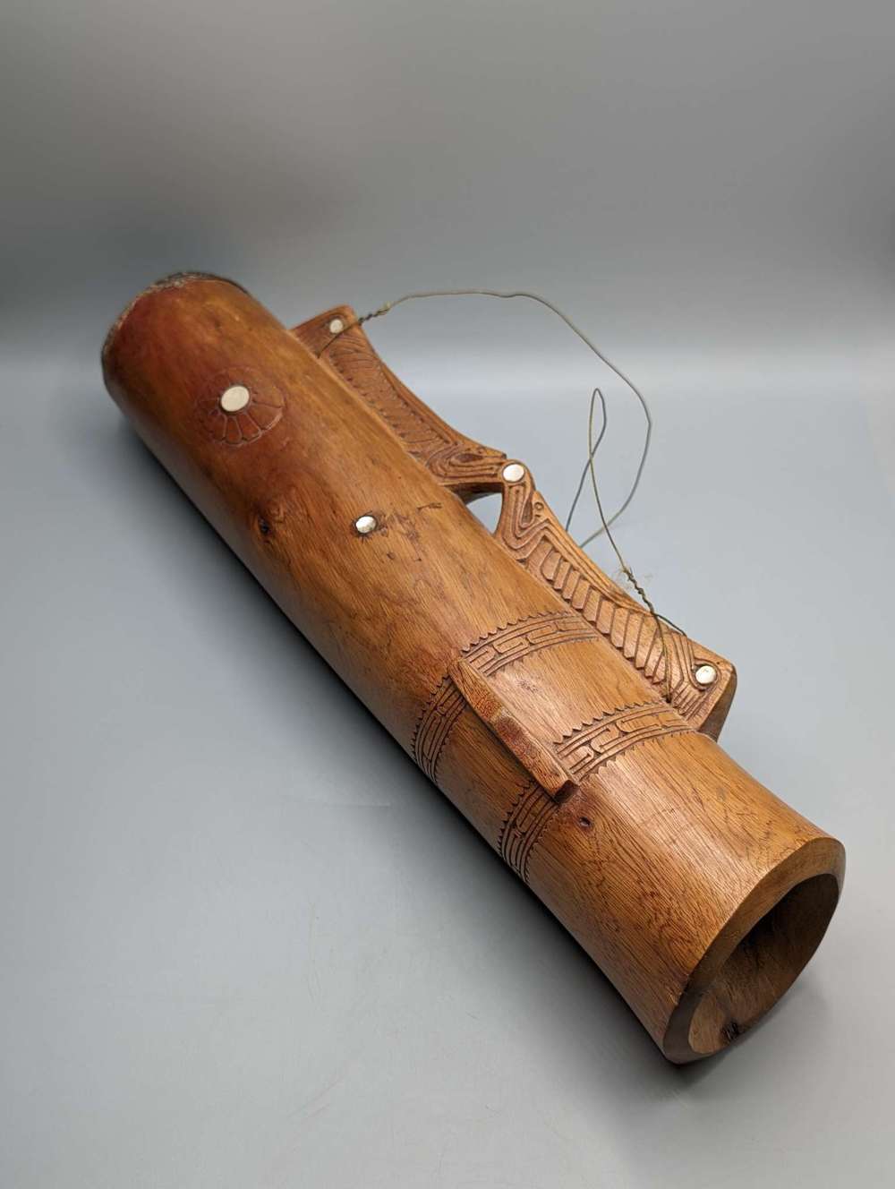 Papua New Guinea hardwood Kundu finger drum with inlay and reptile skin head