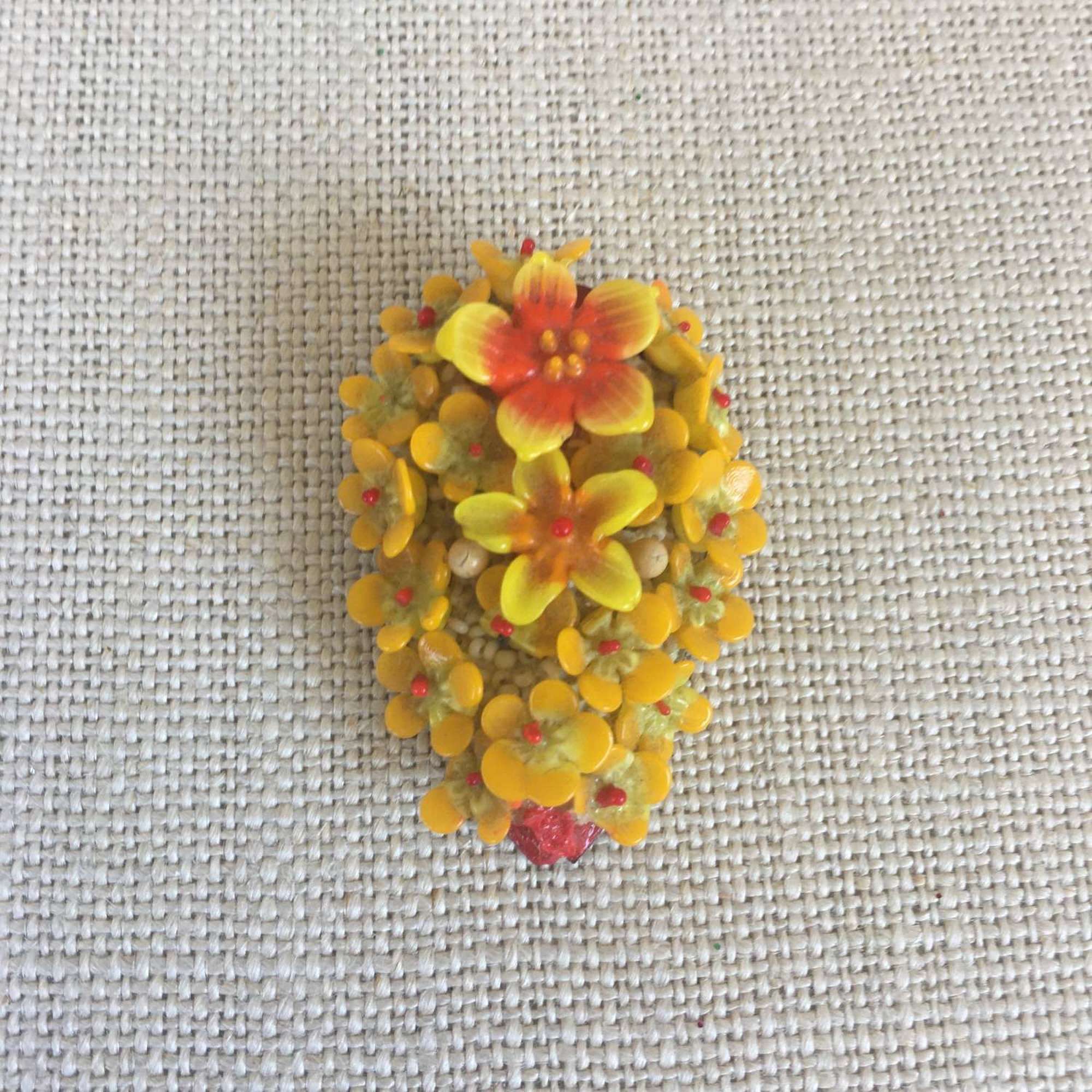 Vintage plastic yellow red floral dress clip