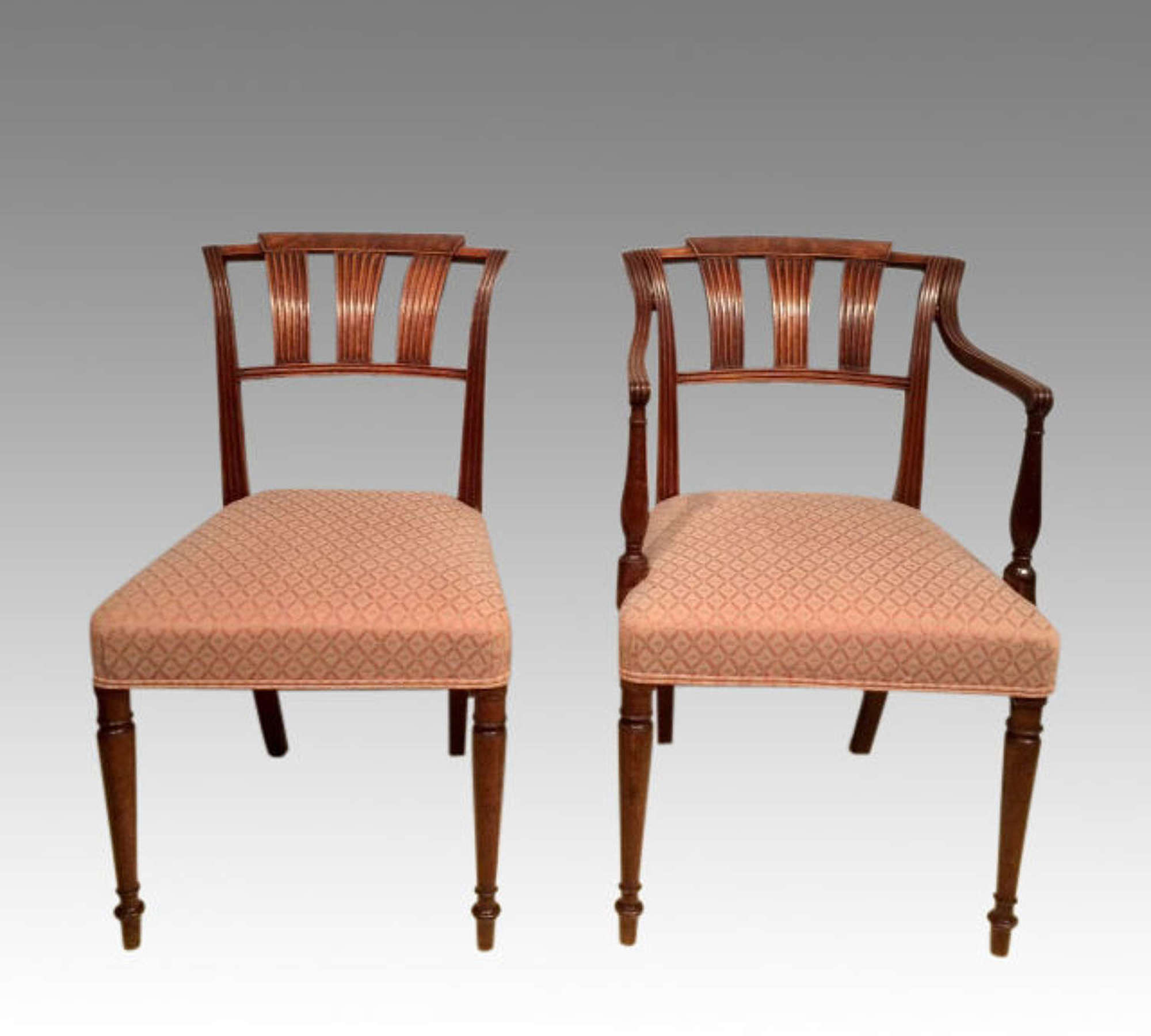 A set of 16 antique Georgian mahogany dining chairs.