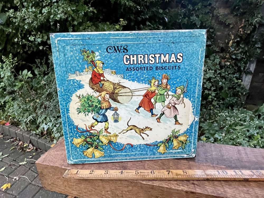 CWS Children pulling the Christmas Yule Log Biscuit Tin c1950s