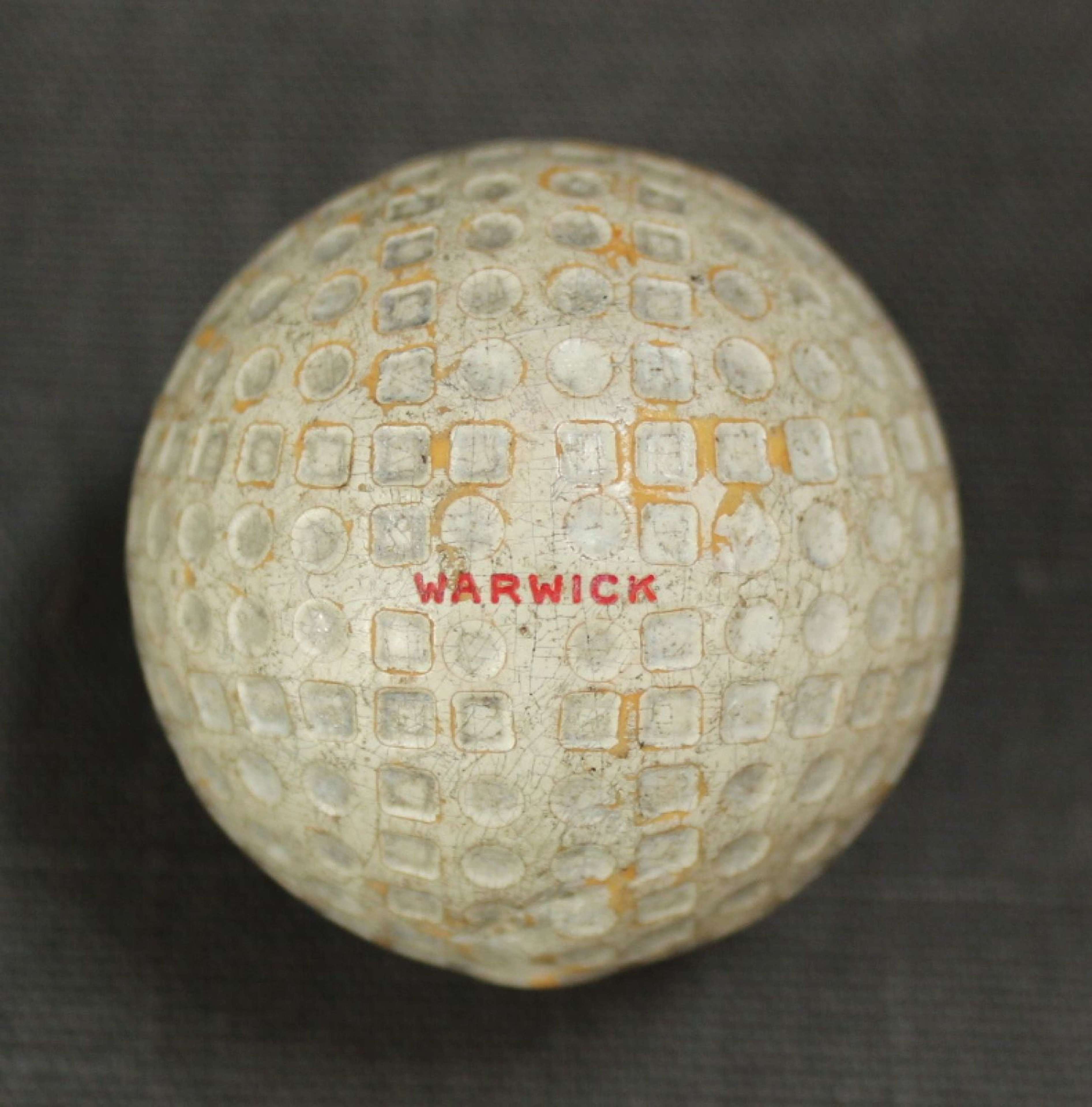 A Warwick square mesh and dot golf ball in Antique Sports & Sporting