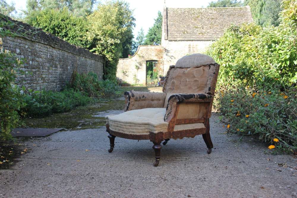A Victorian Armchair On Mahogany Rieded Legs