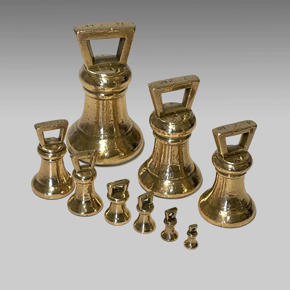19th century collection of bell metal balance scale weights