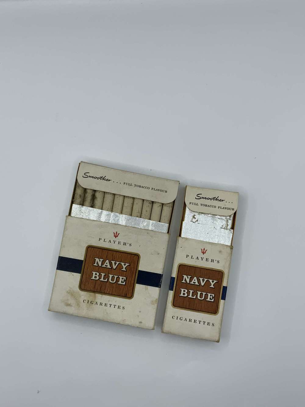 2 players navy blue cigarette packets live