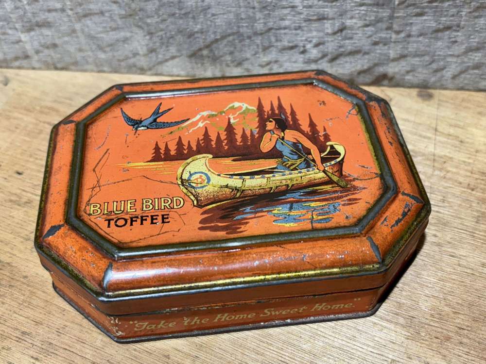 Blue Bird Native Indian in Canoe Toffee Tin c1930s