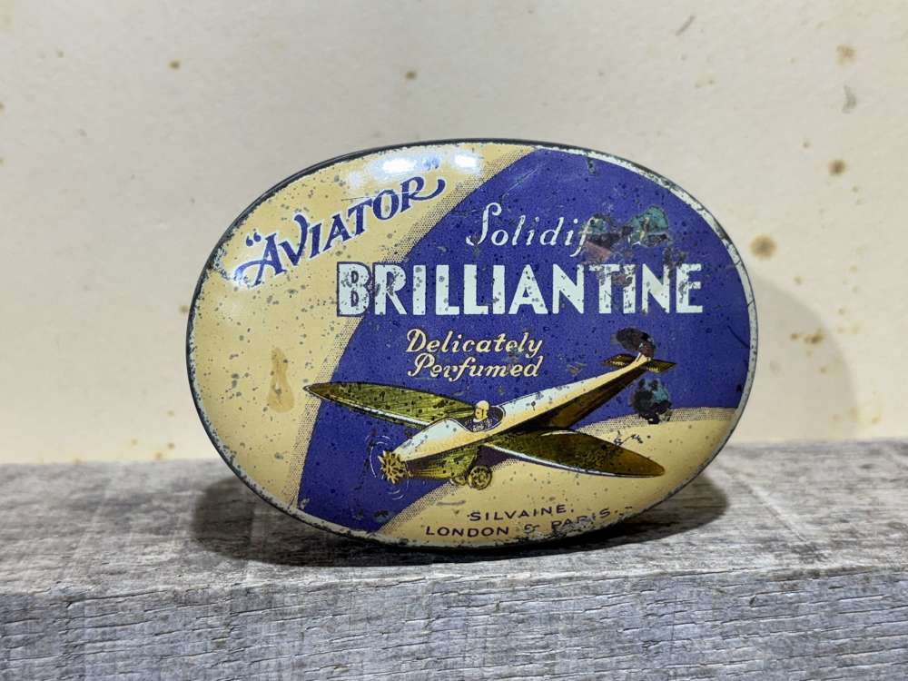 Brilliantine airplane Image Barber Shop Tin c1930s