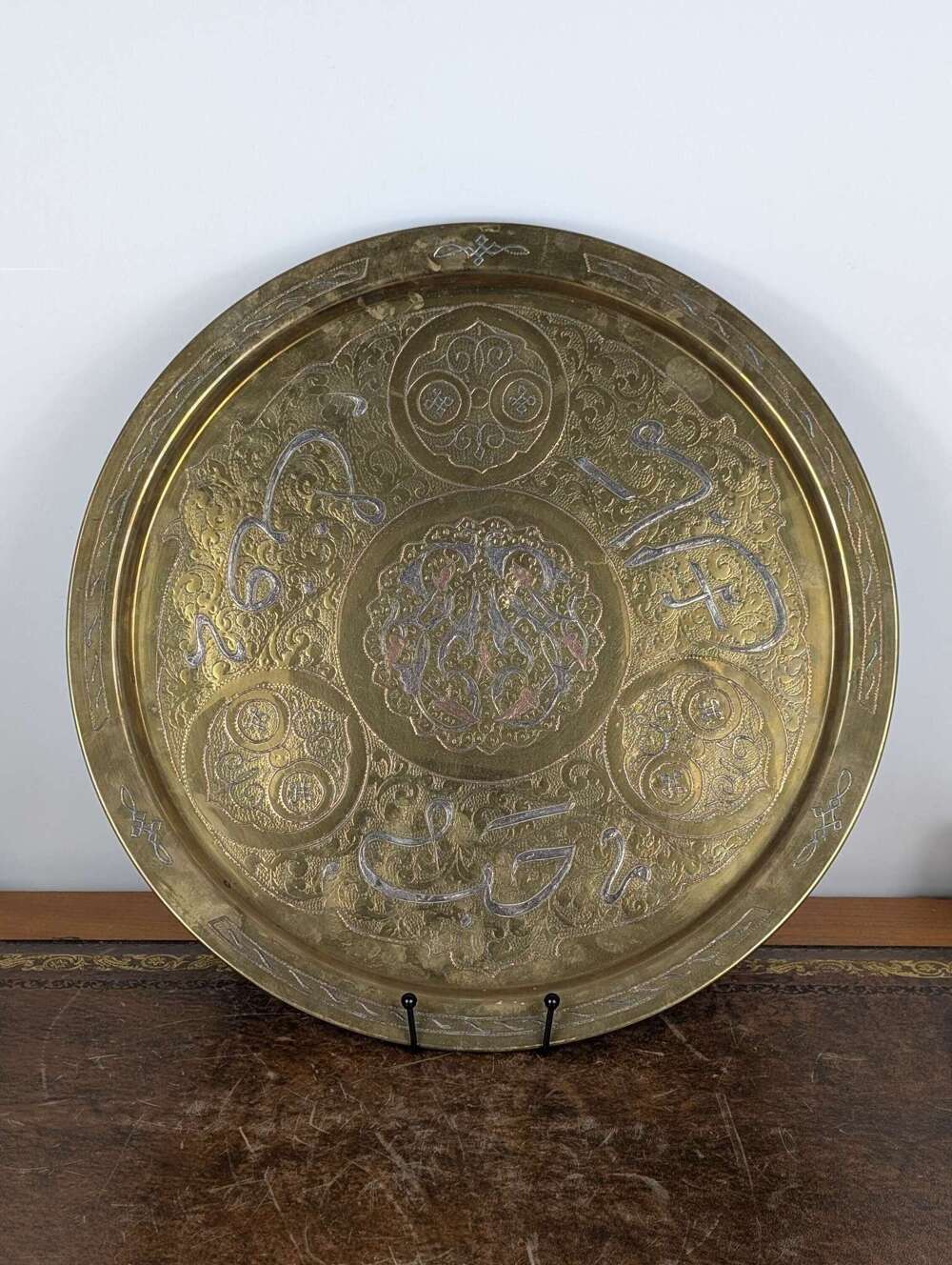 Middle East Mamluk Revival brass charger with Arabic calligraphy in silver & copper inlay