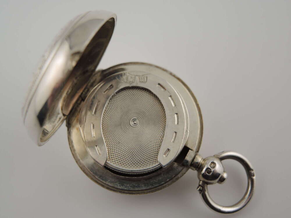 Victorian English silver sovereign case. With horse shoe holder.  Birmingham 1886