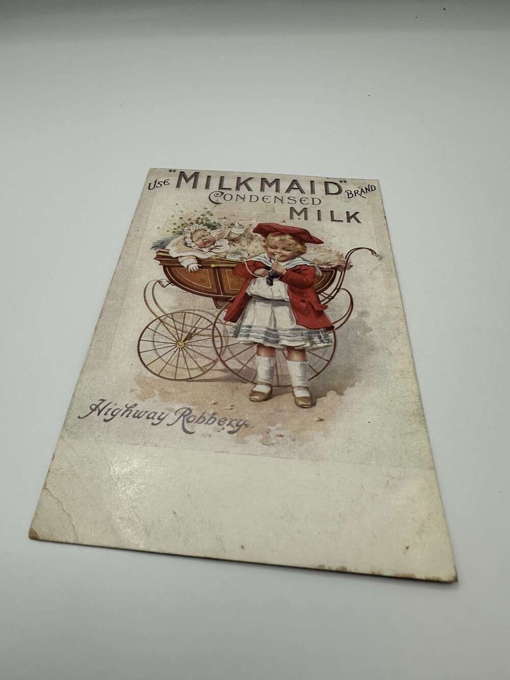 Early milkmaid milk advertising postcard