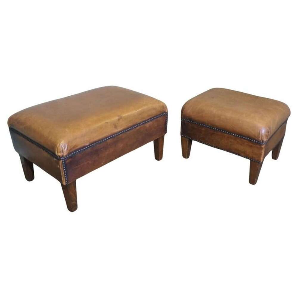 A Set of Two Sturdy Leather Library Foot Stools
