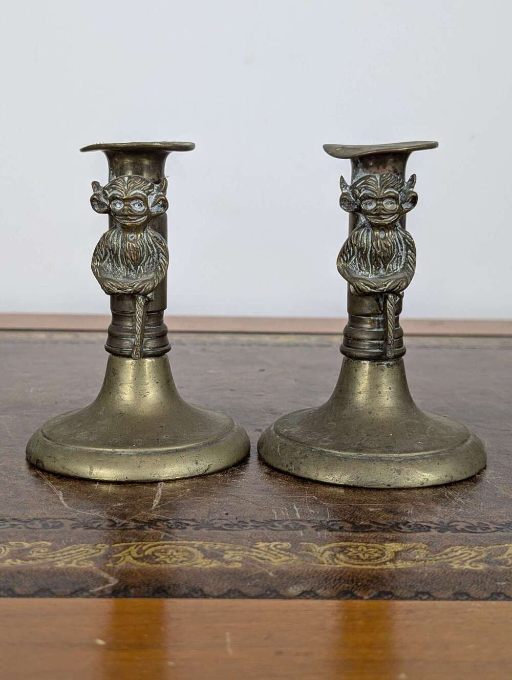 Rare pair Victorian brass Lincoln imp candlesticks in gothic revival style, 19th century
