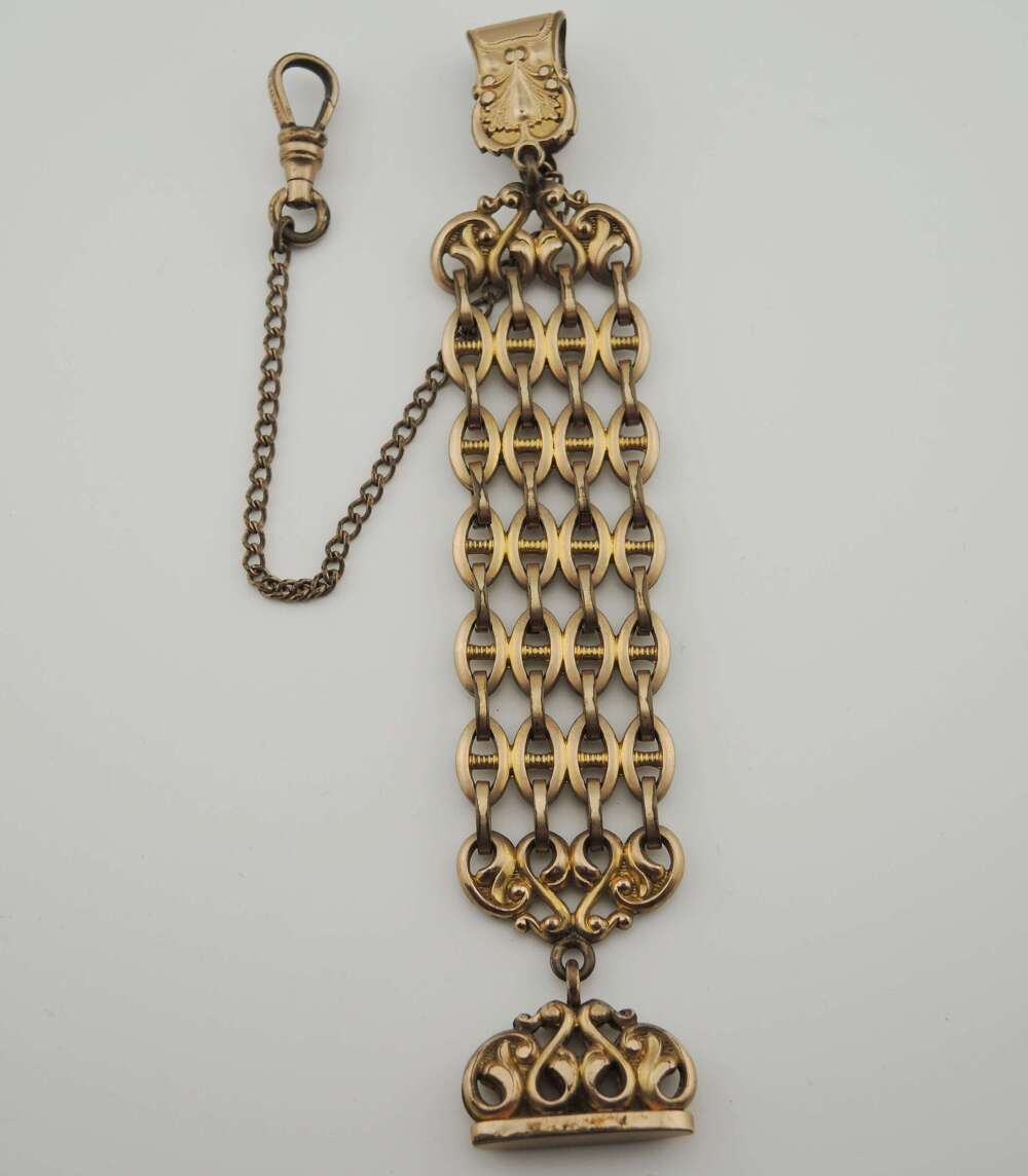Gilt chatelaine with fob c1890