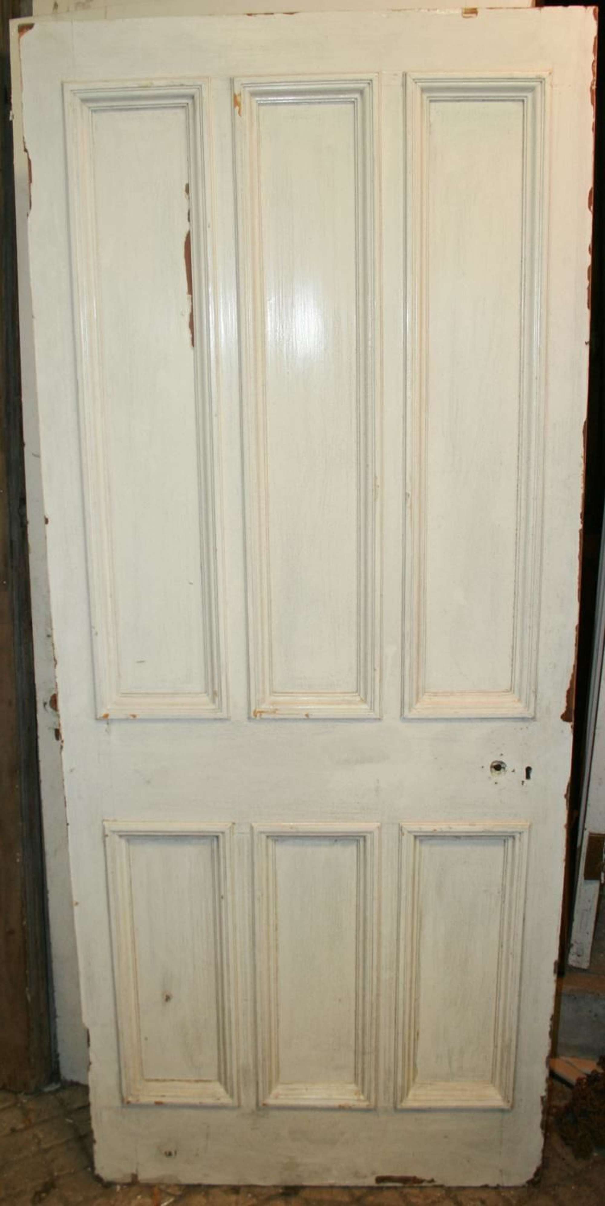 DB0628 A Late Victorian 6 Panelled Pine Door with Bolection Mouldings