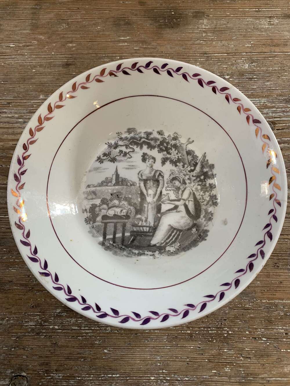 C19th transfer print saucer of women &dog with lustre border