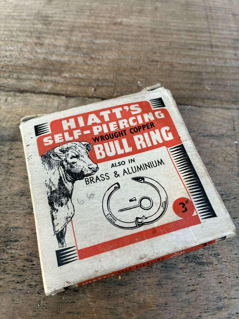 Hiatts self piercing bull ring advertising box and contents