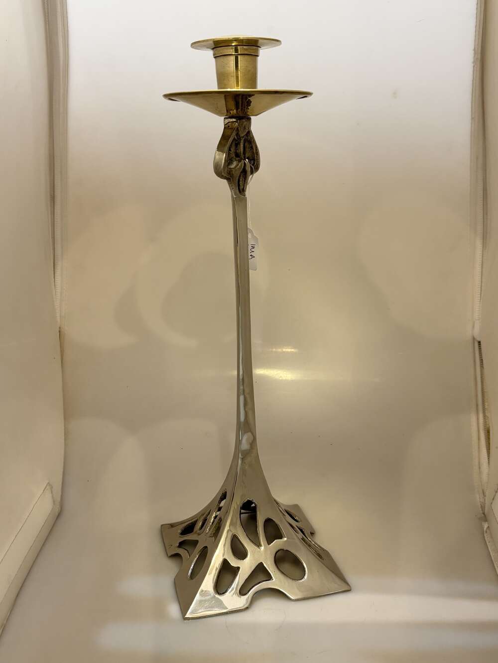 Pair of Tudric style Art Nouveau candlesticks.