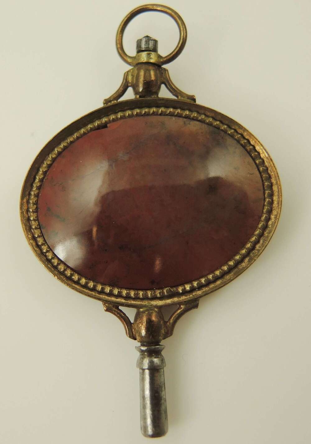Large Georgian pocket watch key set with a moss agate stone c1810