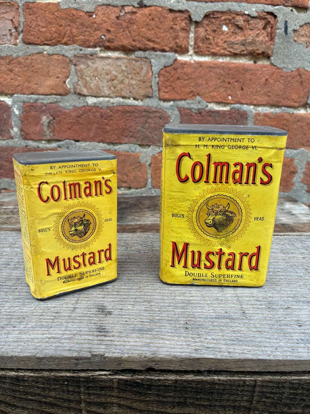 Rare pair of colmand mustard tins sealed with contents.