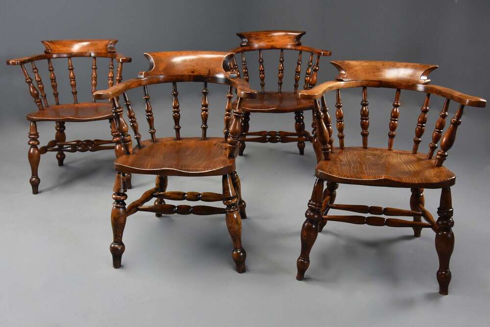 Four mid 19th century smokers bow Windsor or Captain&rsquo;s chairs