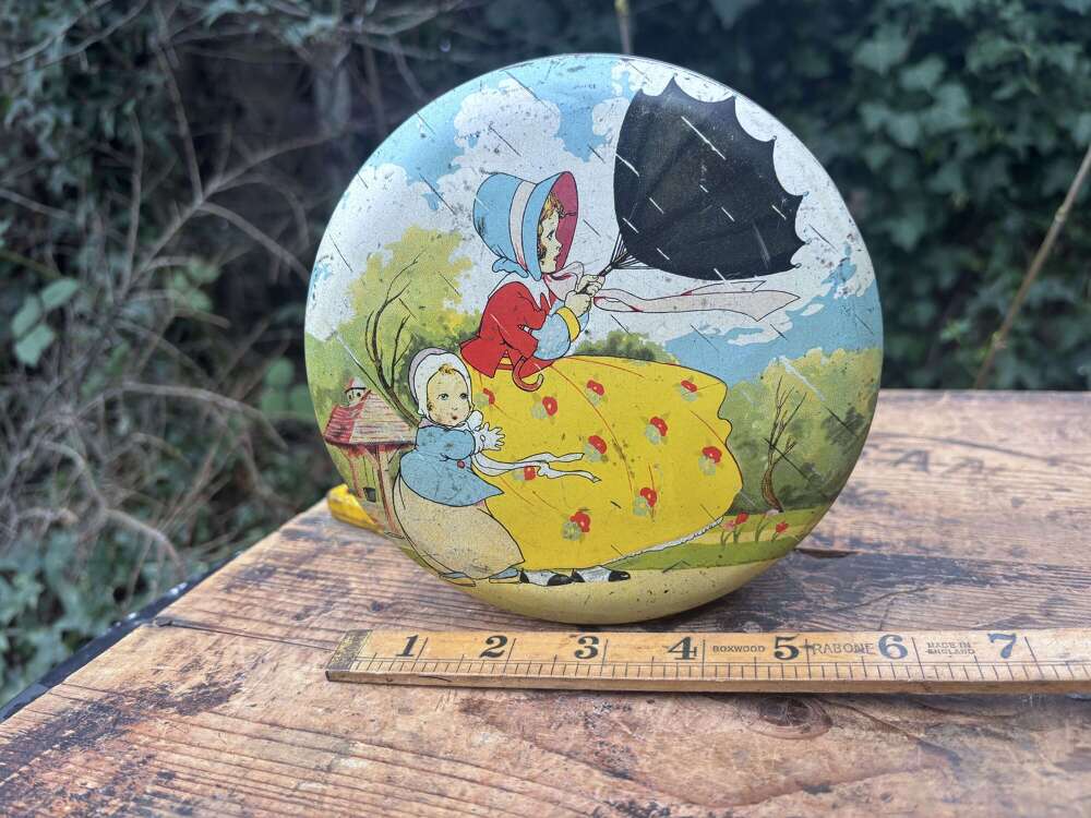 Children In the Rain Toffee Tin c1930s