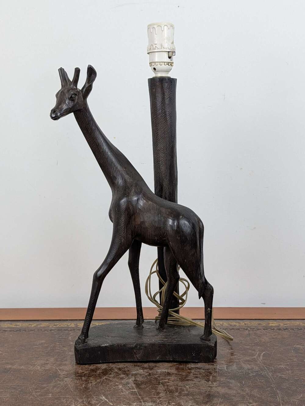 Carved wooden giraffe lamp base, Kenyan. mid 20th century