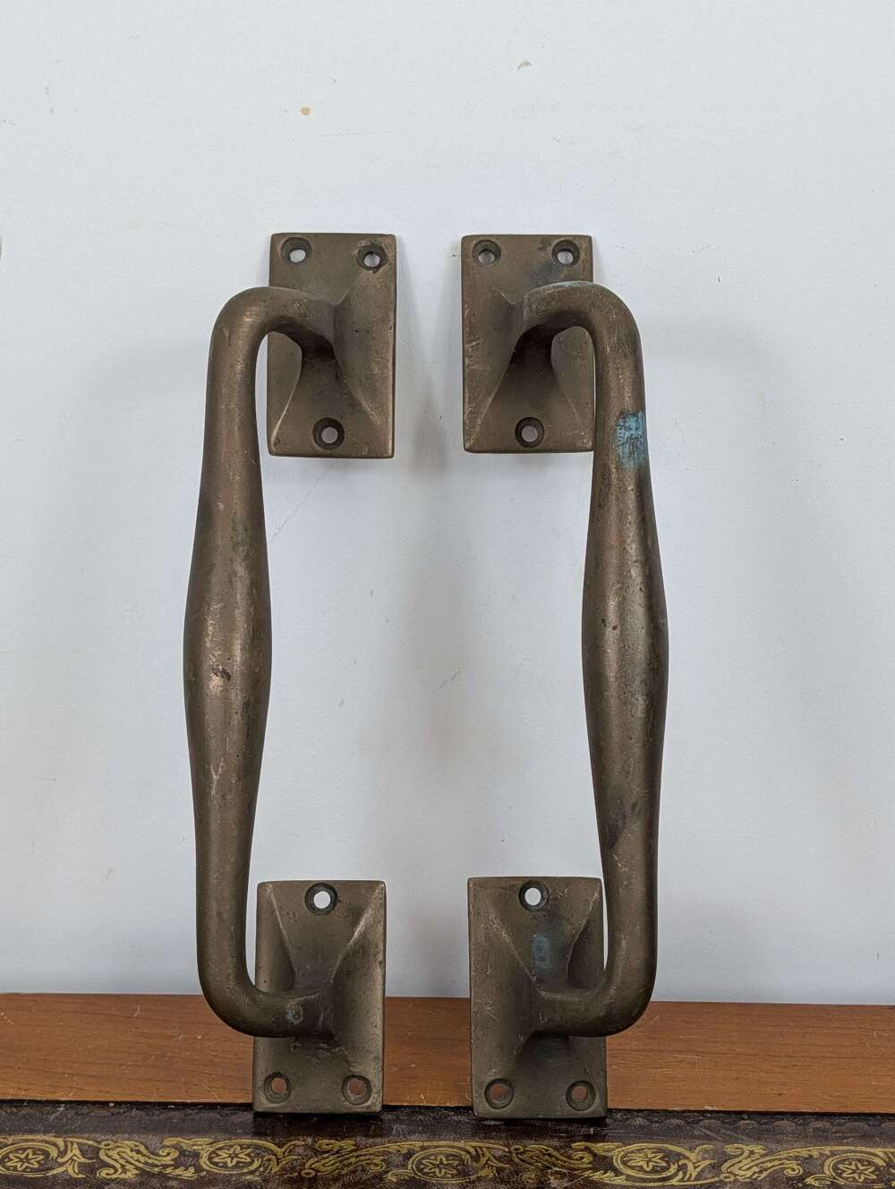Pair bronze reclaimed antique door pull handles, early 20th century