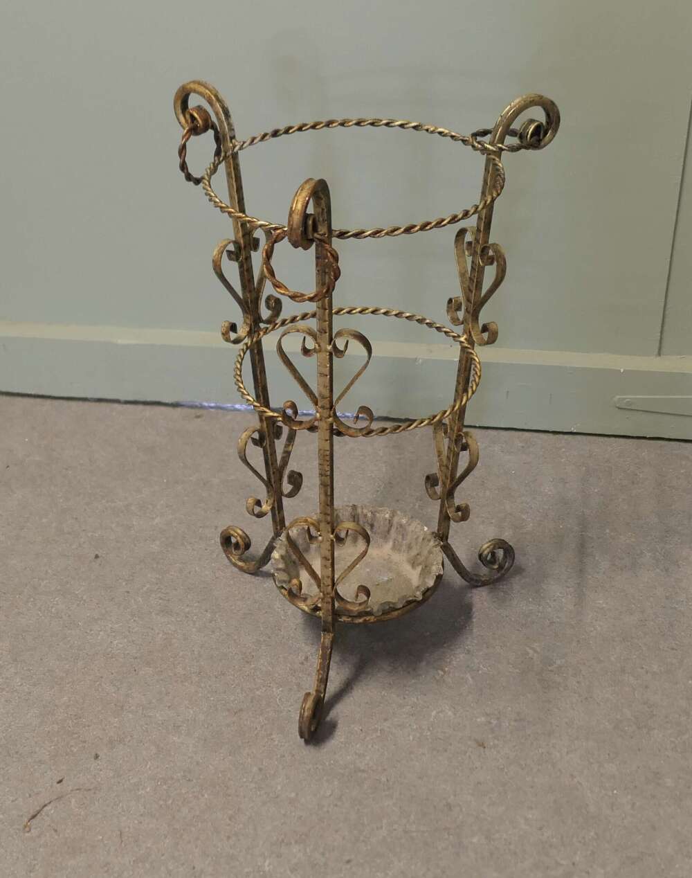 Twisted Metal Walking Stick Stand   A charming 1920s piece with a round shape