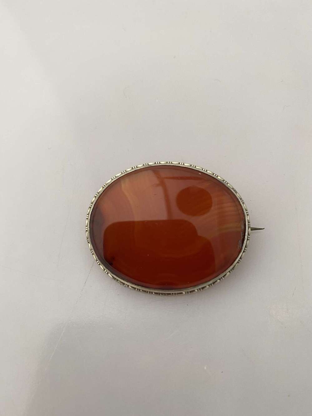 A Scottish silver and agate brooch, circa 1900.