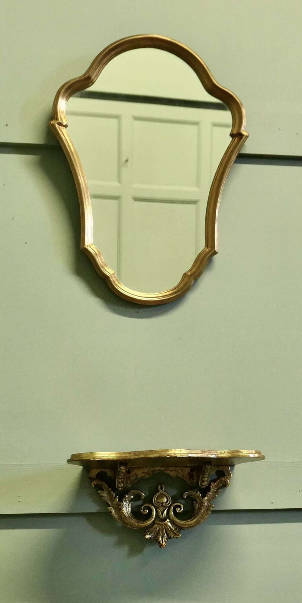 French Gilt Console Mirror with Matching Shelf  This is a lovely unfussy piece