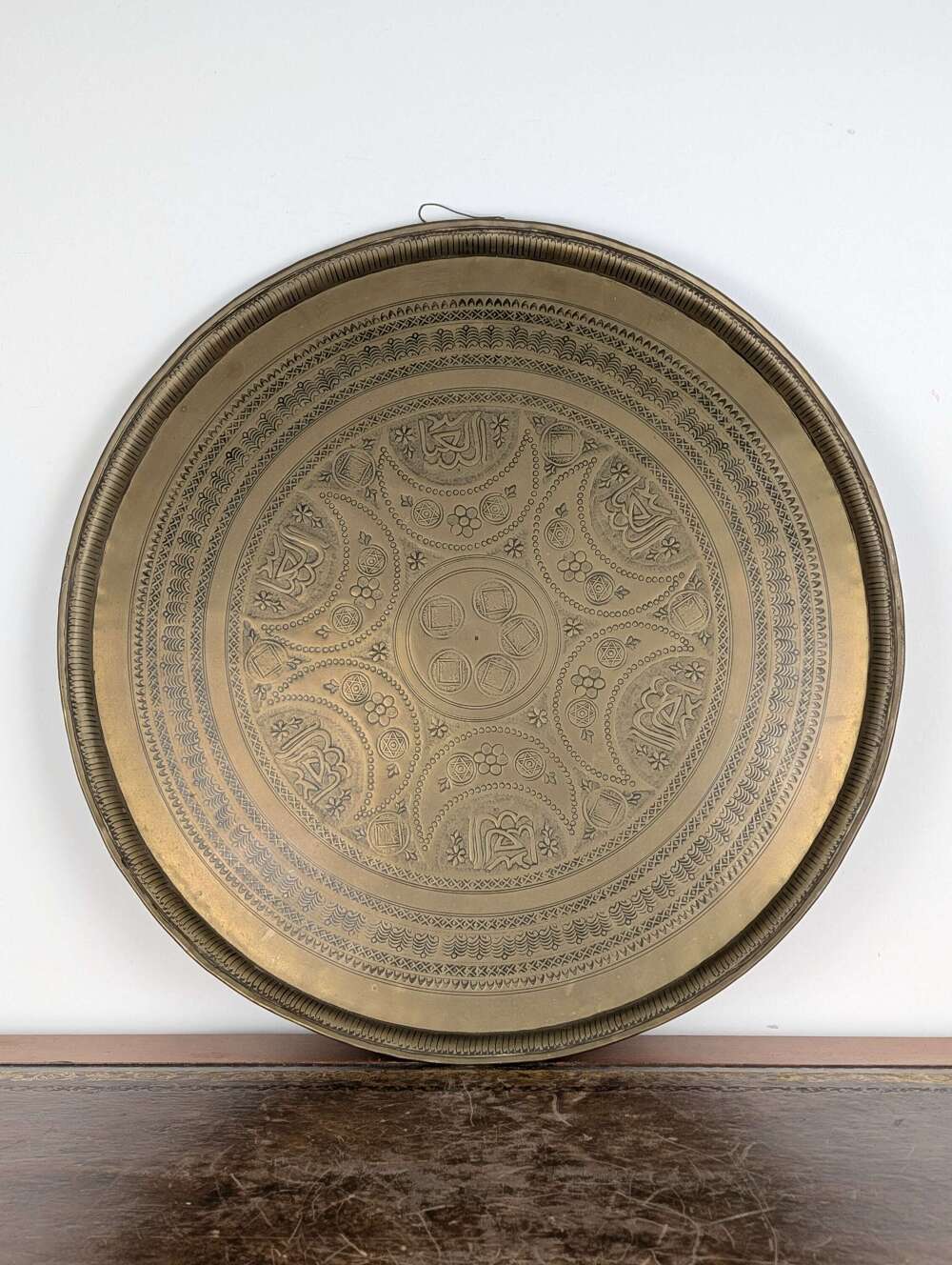 Mamluk revival brass wall charger engraved with Arabic calligraphy & seals, circa 1900