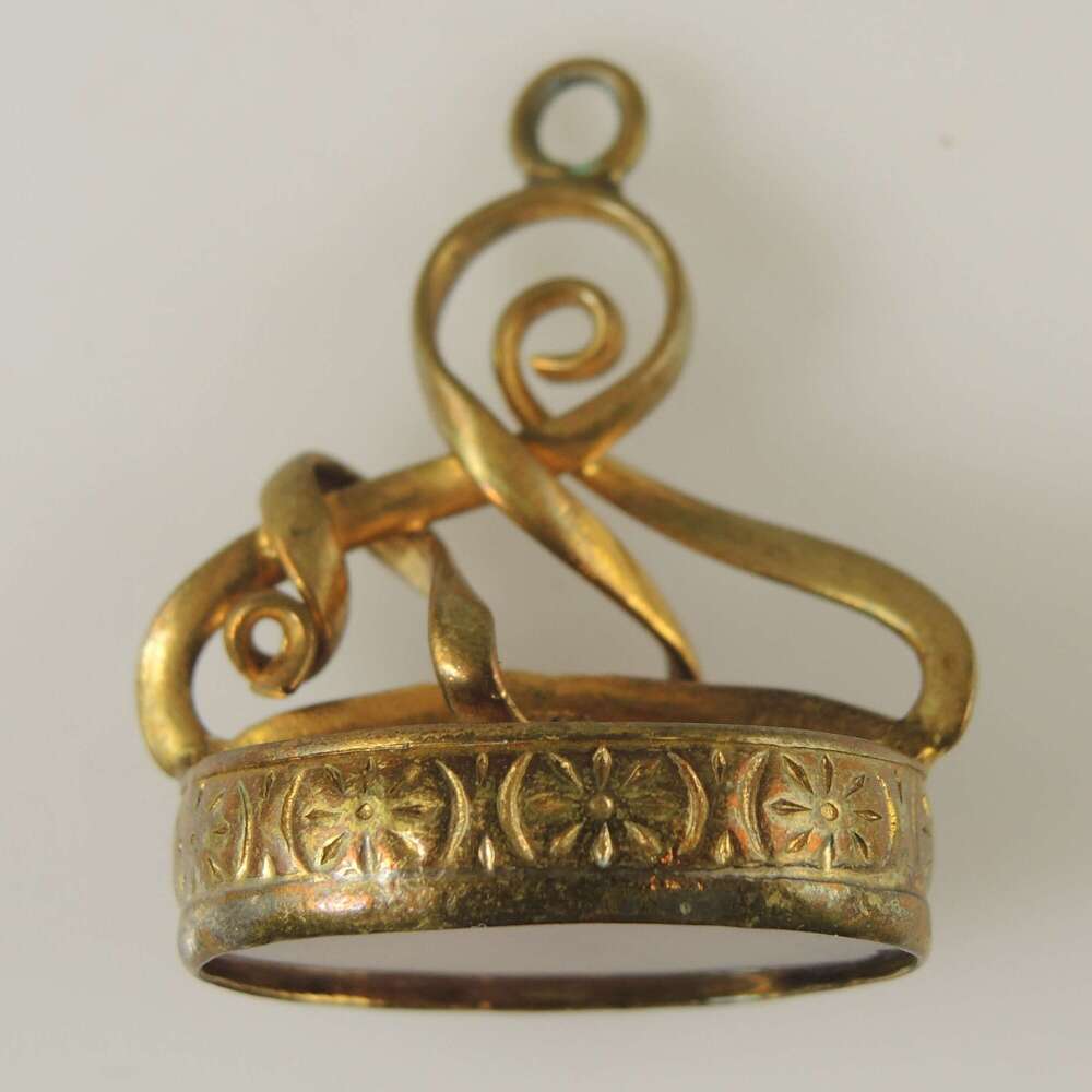 Georgian gilt cased seal set with a glass stone c1810