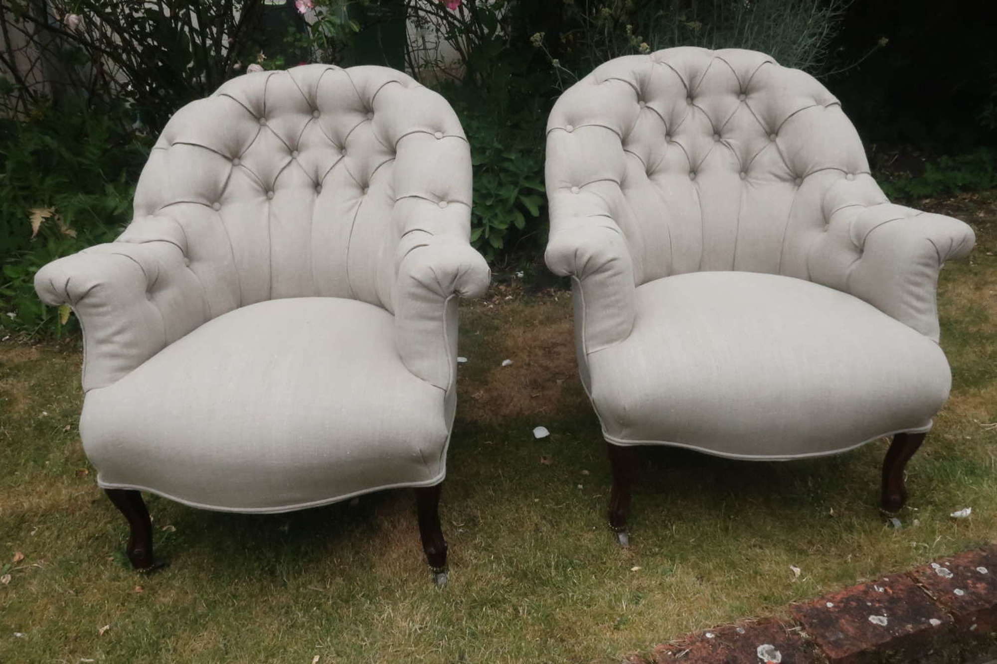 Pair of button back rosewood armchairs