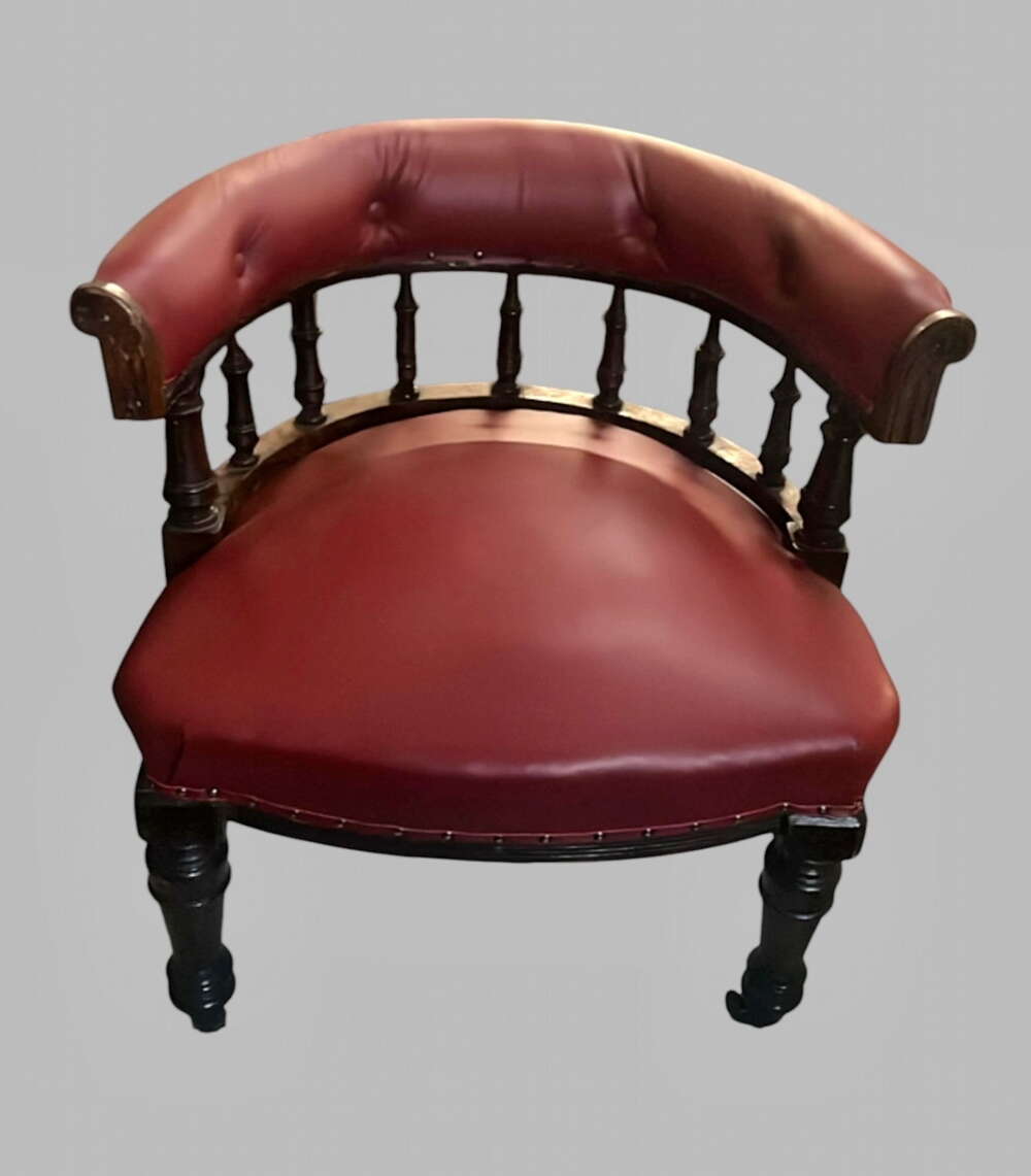 A Victorian Oak Framed Elbow Chair