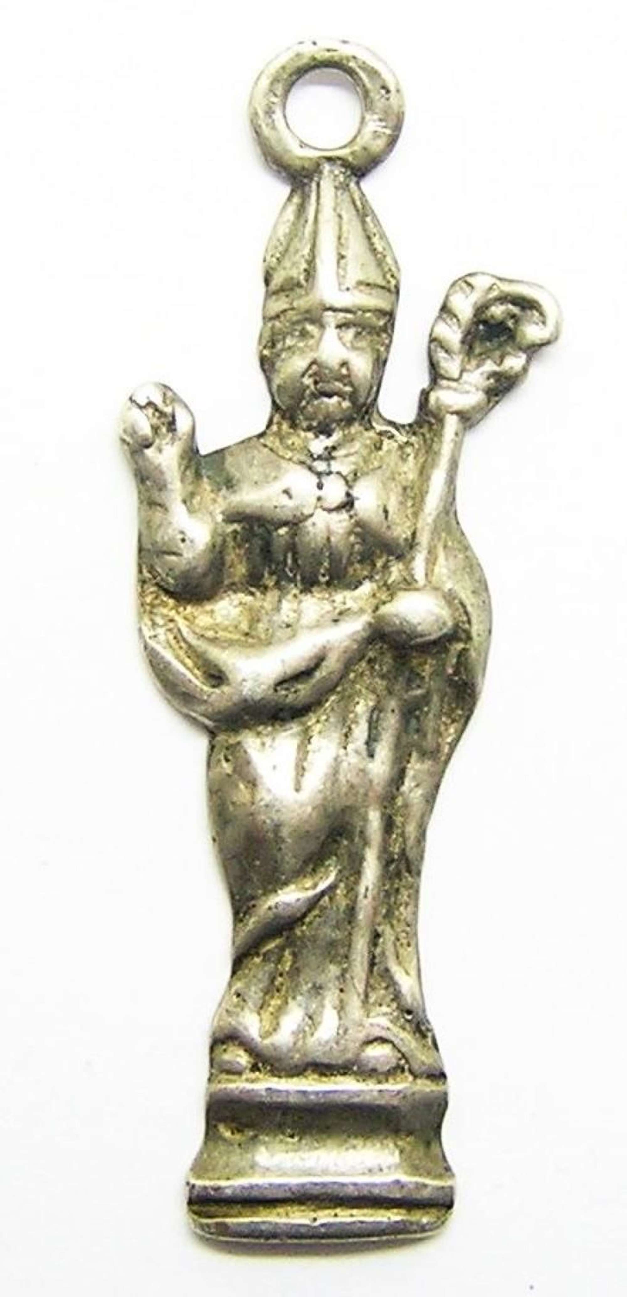 Medieval silver pendant of St. Eligius patron of silversmiths