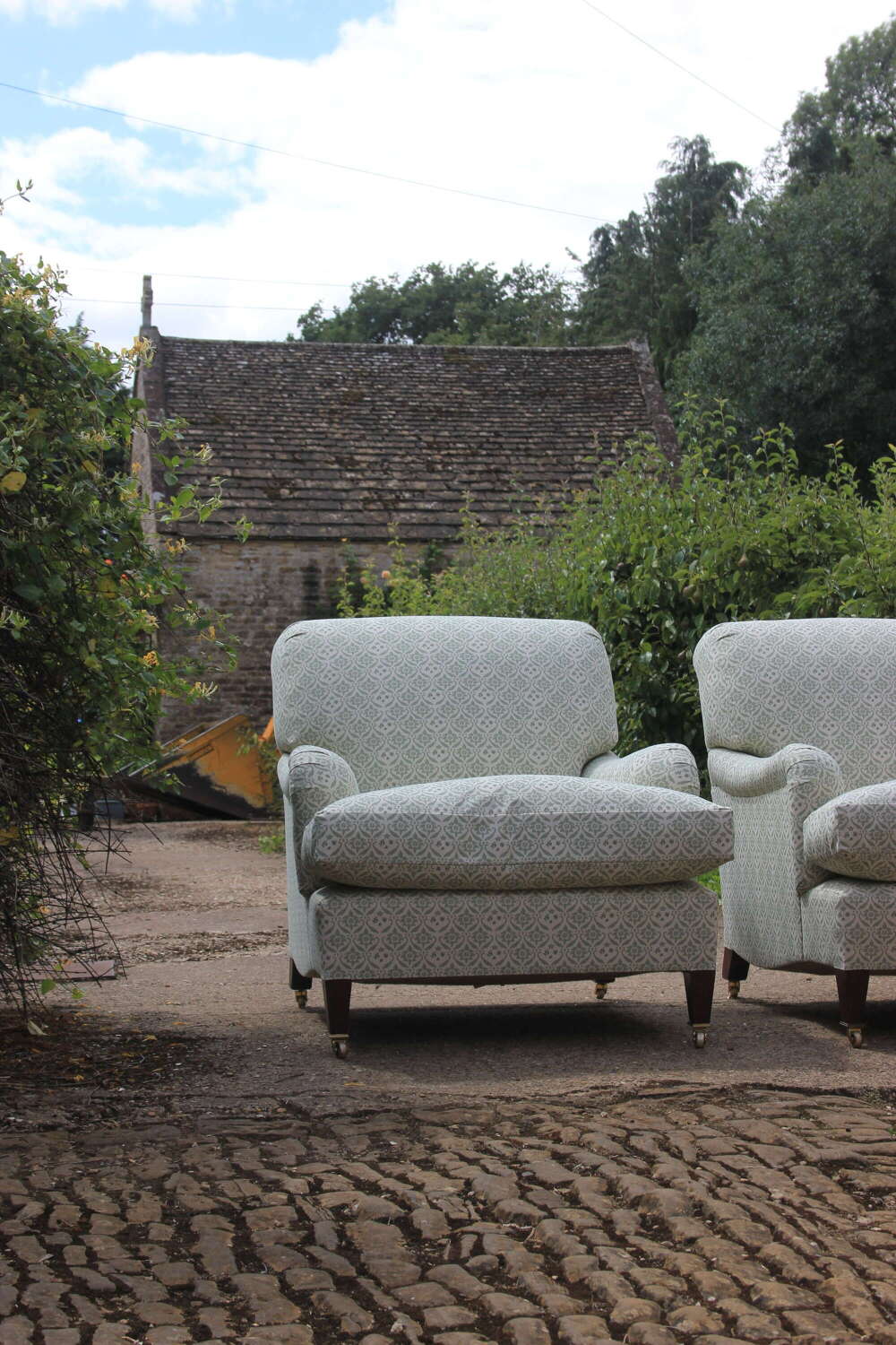Pair of Howard & Sons Ivor armchairs