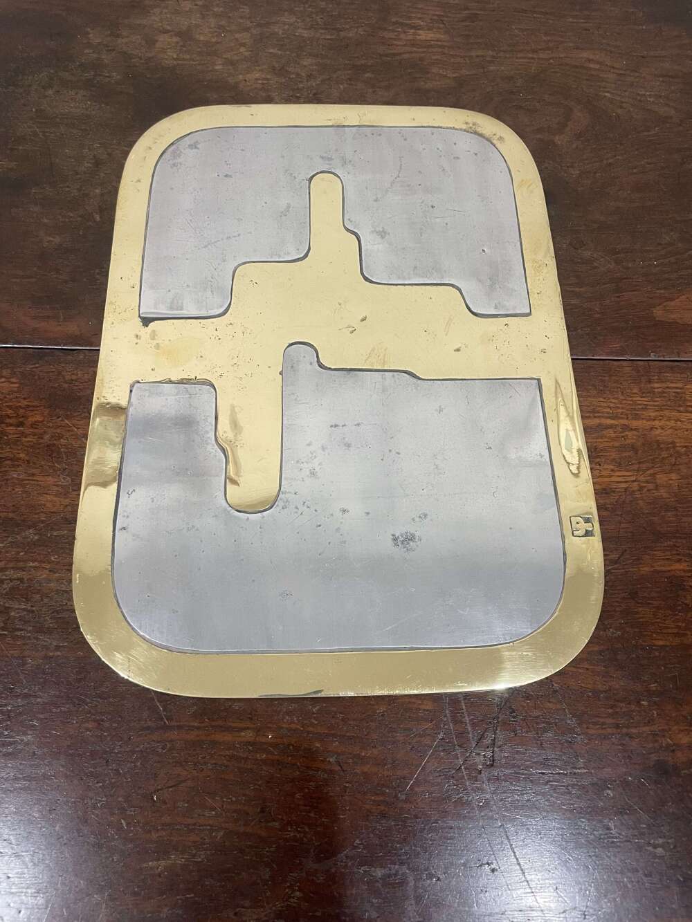 Pair of Brutalist design aluminium and brass mats by David Marshall Disenos