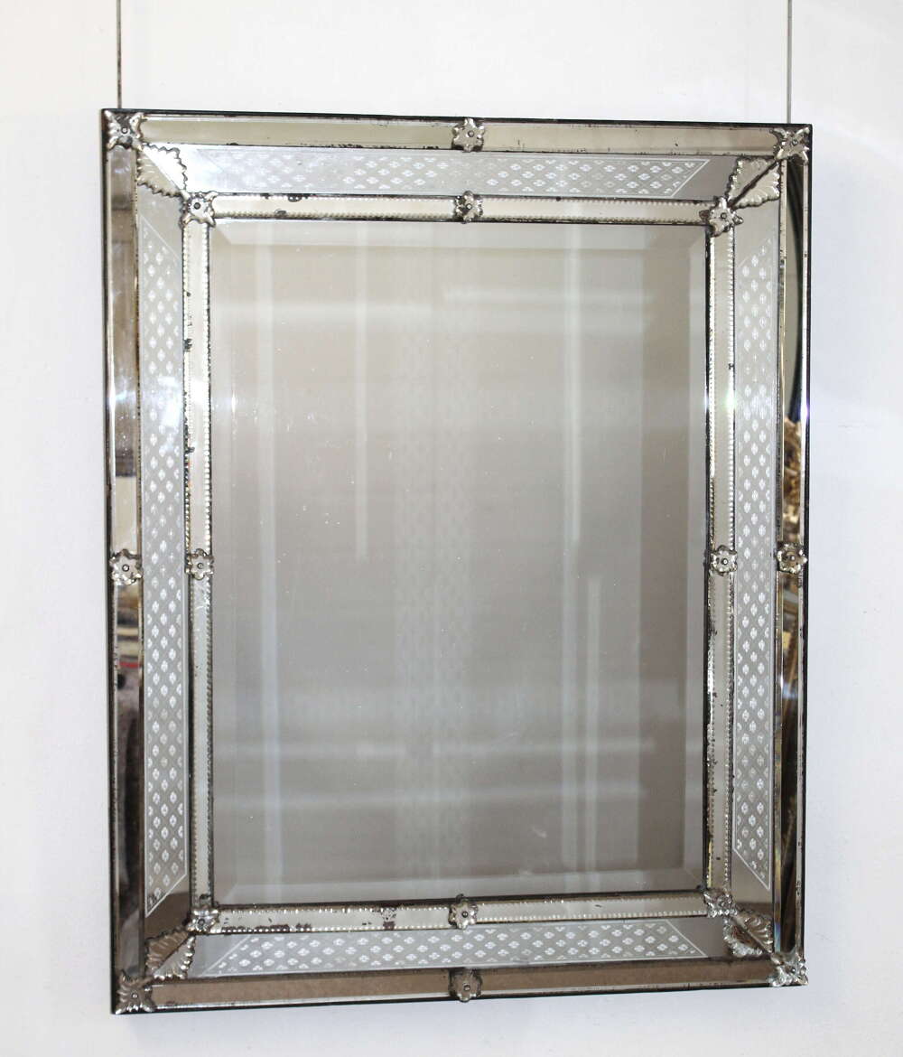 Antique Venetian mirror with layered frame