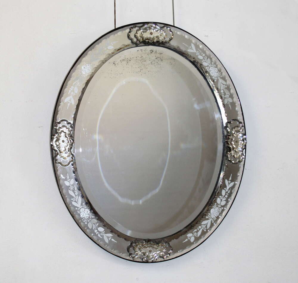 Magnificent antique oval Venetian mirror