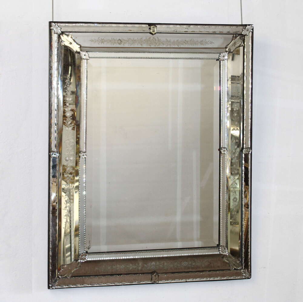 Antique Venetian mirror with exquisitely etched frame