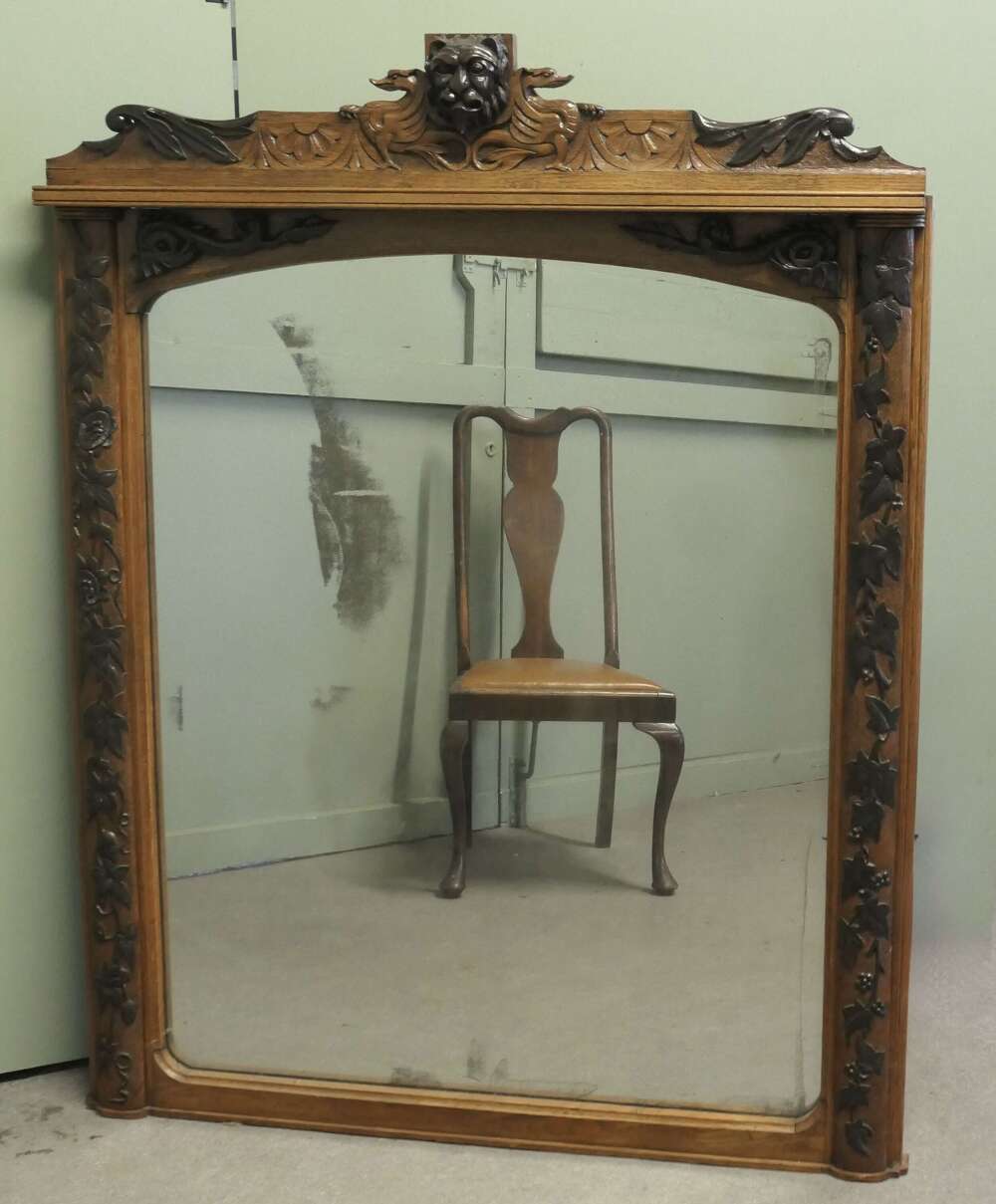 A Large Carved Oak Wall Mirror