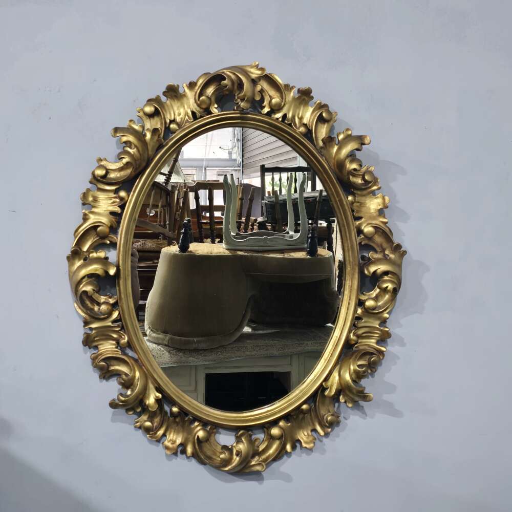 Large Deep Carved Oval Gilt Mirror