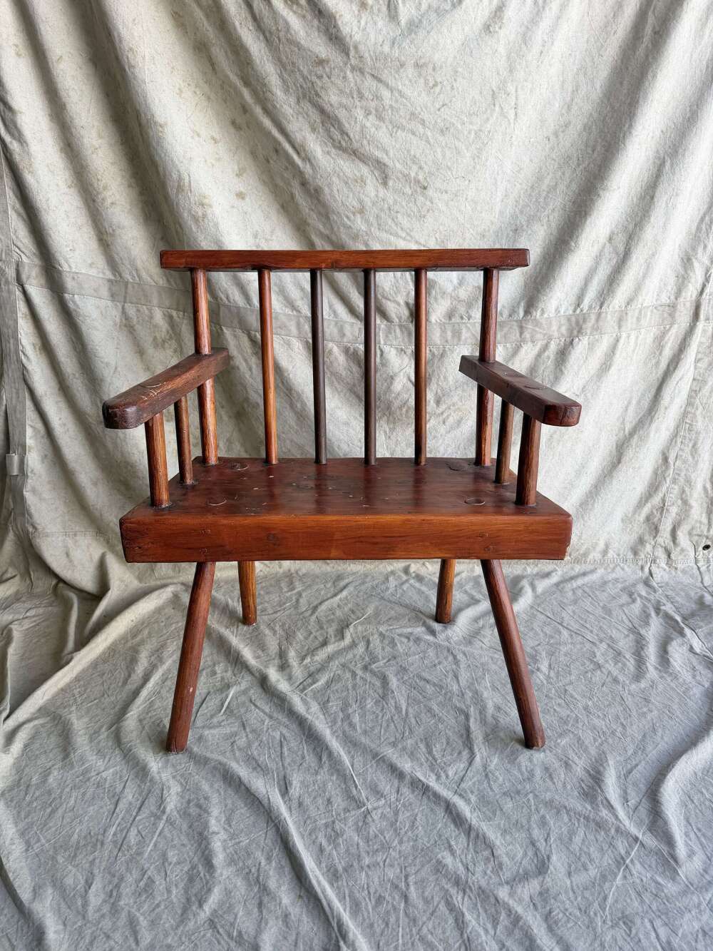 A rustic 1940s Irish vernacular pine famine hedge row chair