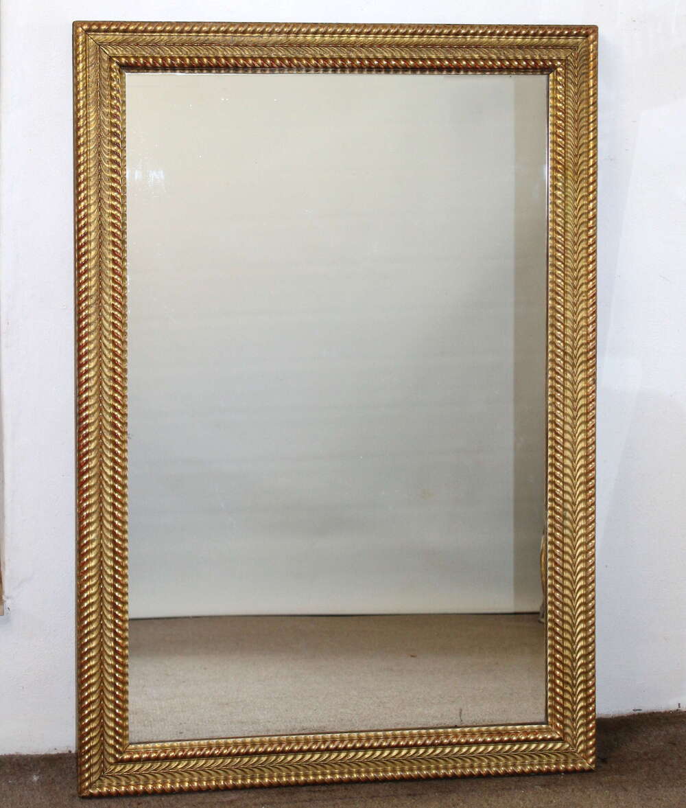 Antique French mirror with gilt rippled frame