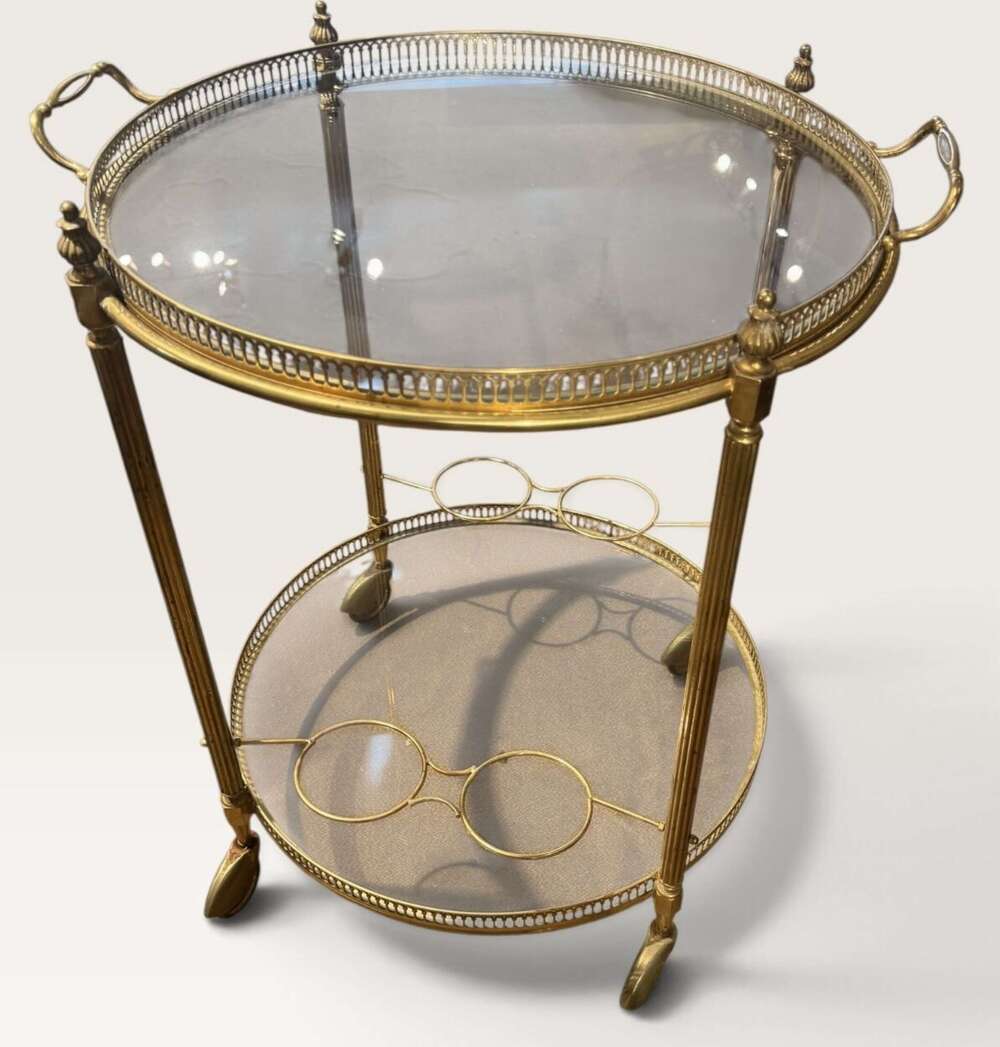 A Mid Century brass and glass drinks trolley