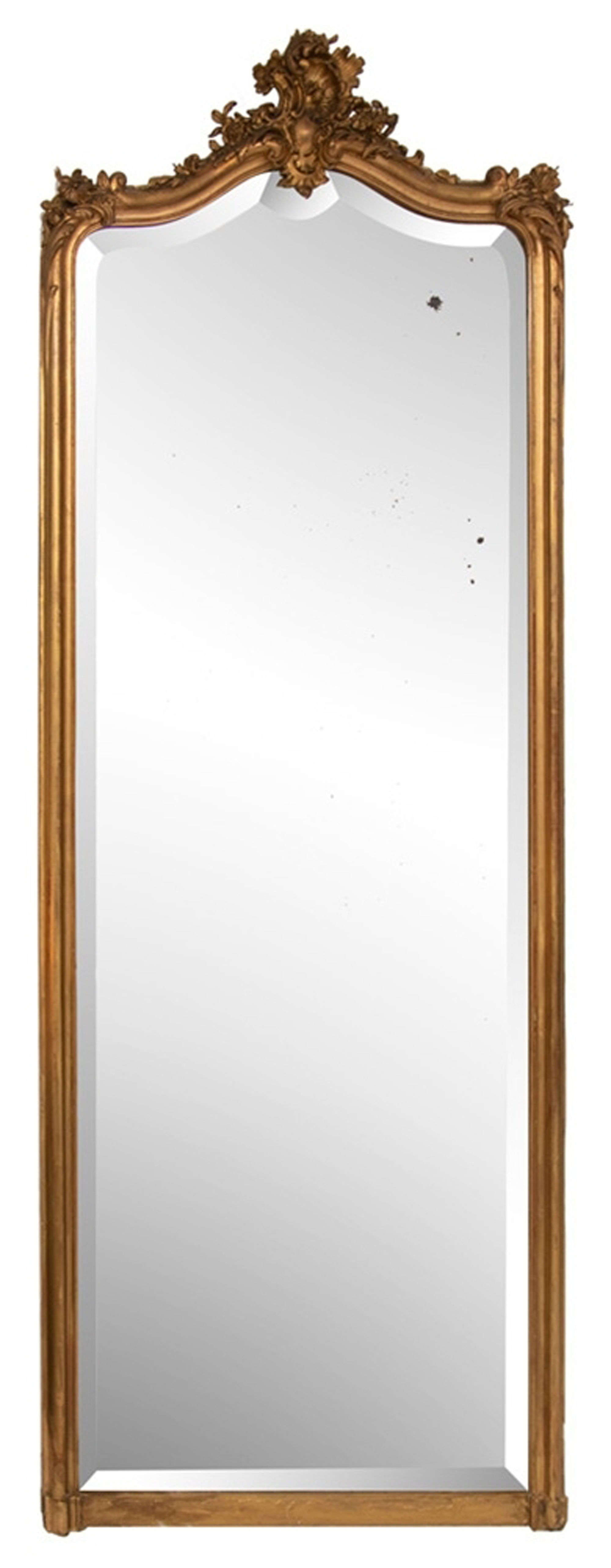 An antique gilded full-length mirror