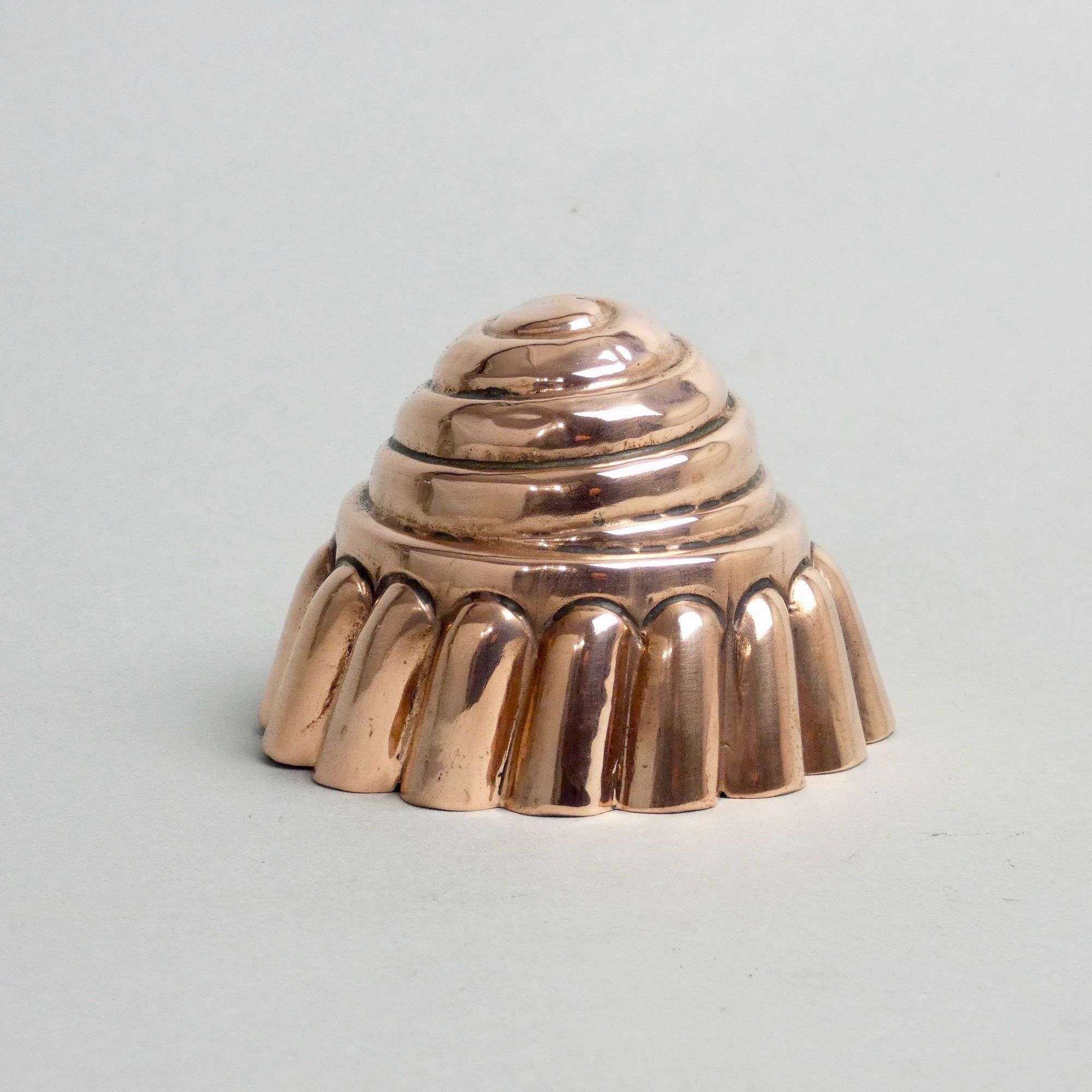 Small, spiral form copper mould.
